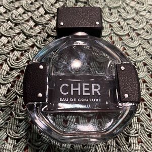 3/4 full bottle of Eau De Couture Eau Se Parfum, 1.7 ounce by Cher, no box
